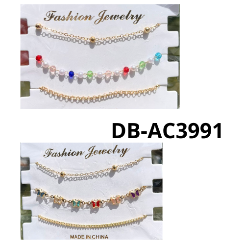TRIO DE PULSERAS DORADAS CON DISEÑOS SURTIDOS FASHION JEWELRY DB-AC3991