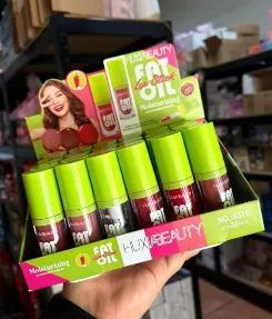 GLOSS CON APLICADOR GRUESO HUXIABEAUTY FAT OIL TAPA VERDE