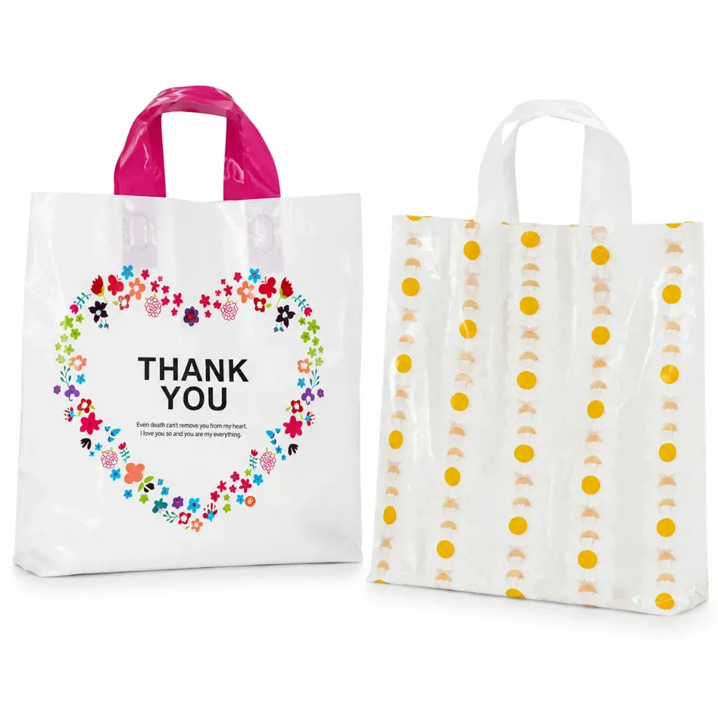 BOLSAS TIPO BOUTIQUE DE POLIETILENO DISEÑOS SURTIDOS 34.5CM*30CM
